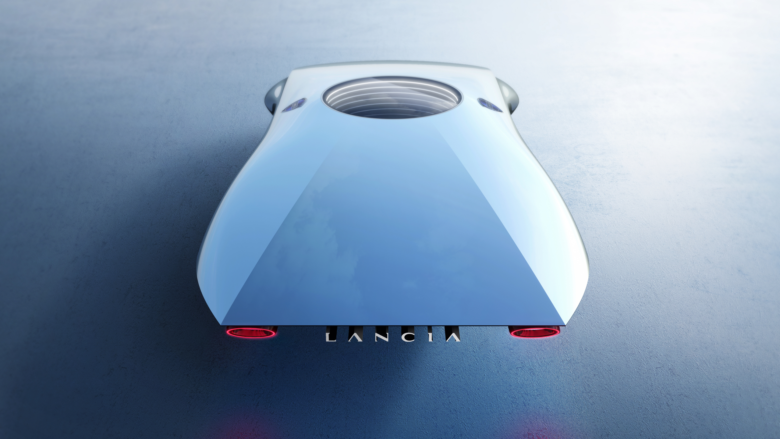 Lancia komt met drie nieuwe modellen die lijken op deze gestroomlijnde dakkoffer